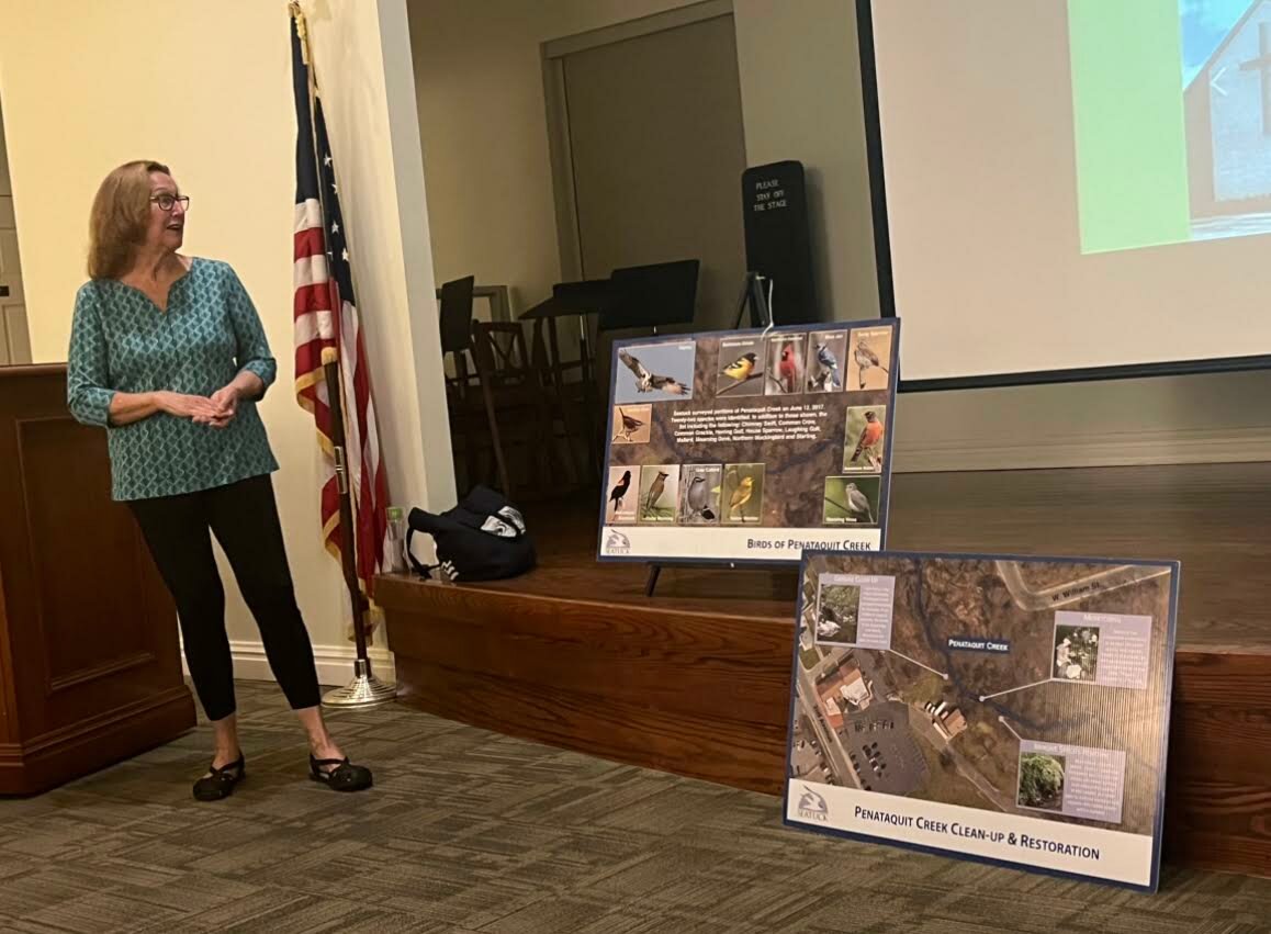 Maureen Dunn presents information about the Penataquit Creek Restoration project.
